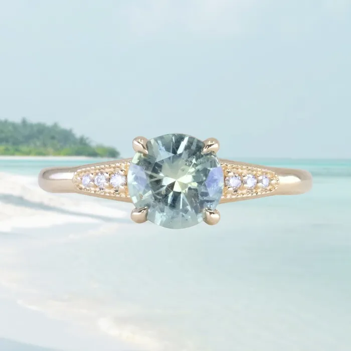 132ct Untreated Round BlueGreen Montana Sapphire Four Prong Low Profile Milgrain and Diamond Ring in 14k Yellow Gold Anueva Jewelry Rings 132ct Untreated Round BlueGreen Montana Sapphire Four Prong Low Profile Milgrain and Diamond Ring in 14k Yellow Gold Anueva Jewelry Rings