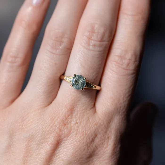 132ct Untreated Round BlueGreen Montana Sapphire Four Prong Low Profile Milgrain and Diamond Ring in 14k Yellow Gold Anueva Jewelry Rings