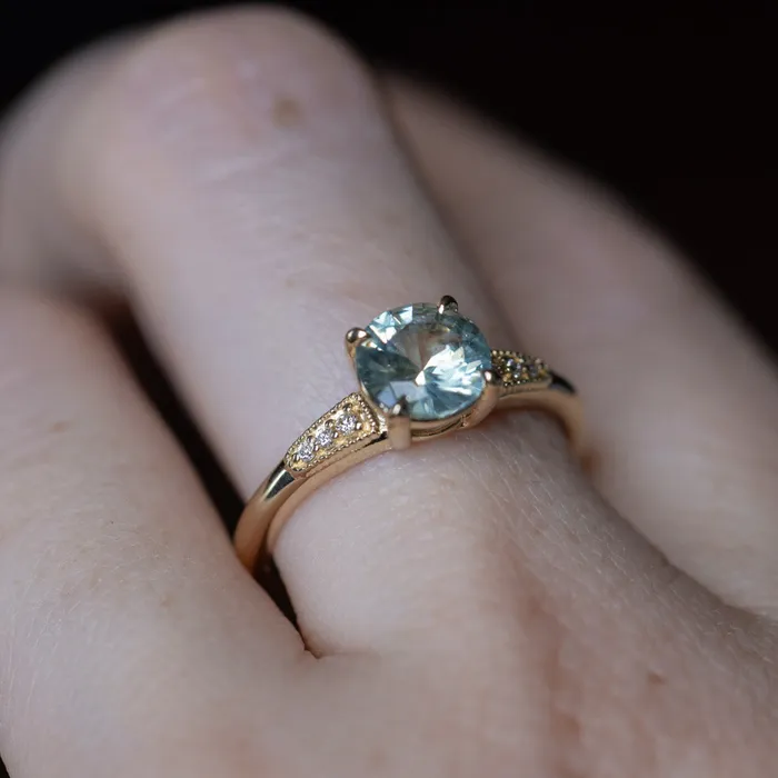 132ct Untreated Round BlueGreen Montana Sapphire Four Prong Low Profile Milgrain and Diamond Ring in 14k Yellow Gold Anueva Jewelry Rings