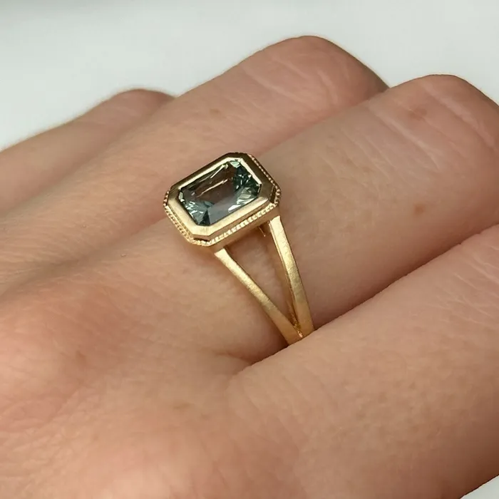 Anueva Jewelry Rings 120ct Radiant Cut Seafoam Montana Sapphire Split Shank Bezel Ring with Milgrain in 14k Yellow Gold