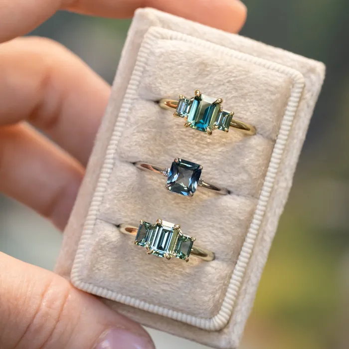 PAUL COCA Rings 095ct Madagascar Emerald Cut and 067ctw Montana Sapphire Three Stone Low Profile Ring in 14k Green Gold