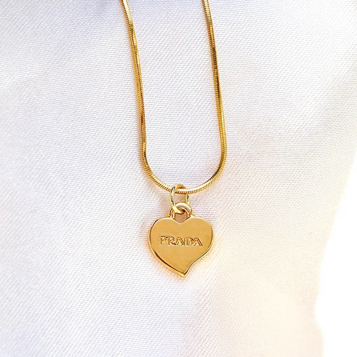 Reluxe Vintage Necklaces Prada Gold Heart Necklace