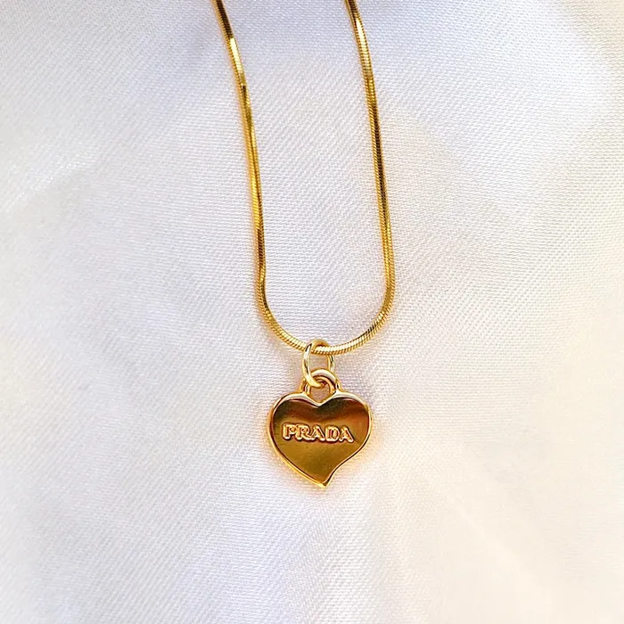 Reluxe Vintage Necklaces Prada Gold Heart Necklace